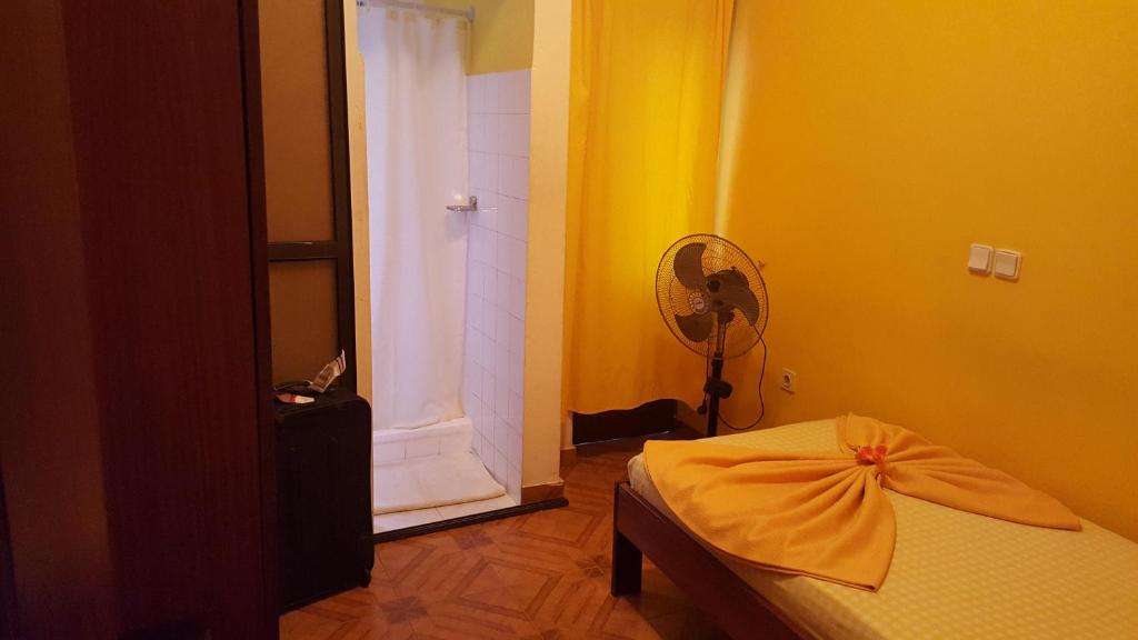 Postel nebo postele na pokoji v ubytování Chez Loutcha Residencial