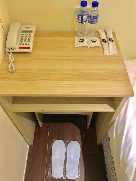 Postel nebo postele na pokoji v ubytování Hotel 18 DIMILIKI OLEH HOTEL MY HOME STATION 18 SDN BHD