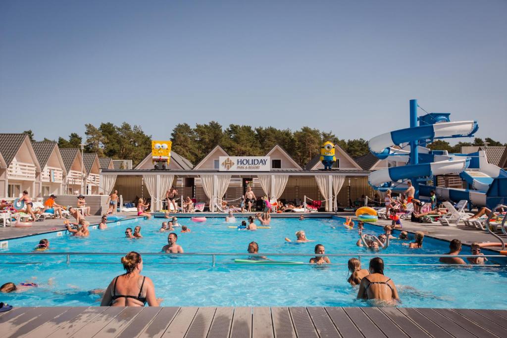 a group of people in a pool at a water park at Holiday Park & Resort Niechorze Rewal in Niechorze