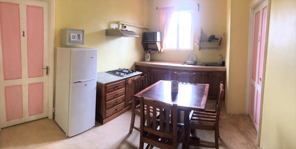 Kuchyň nebo kuchyňský kout v ubytování Le Rosier