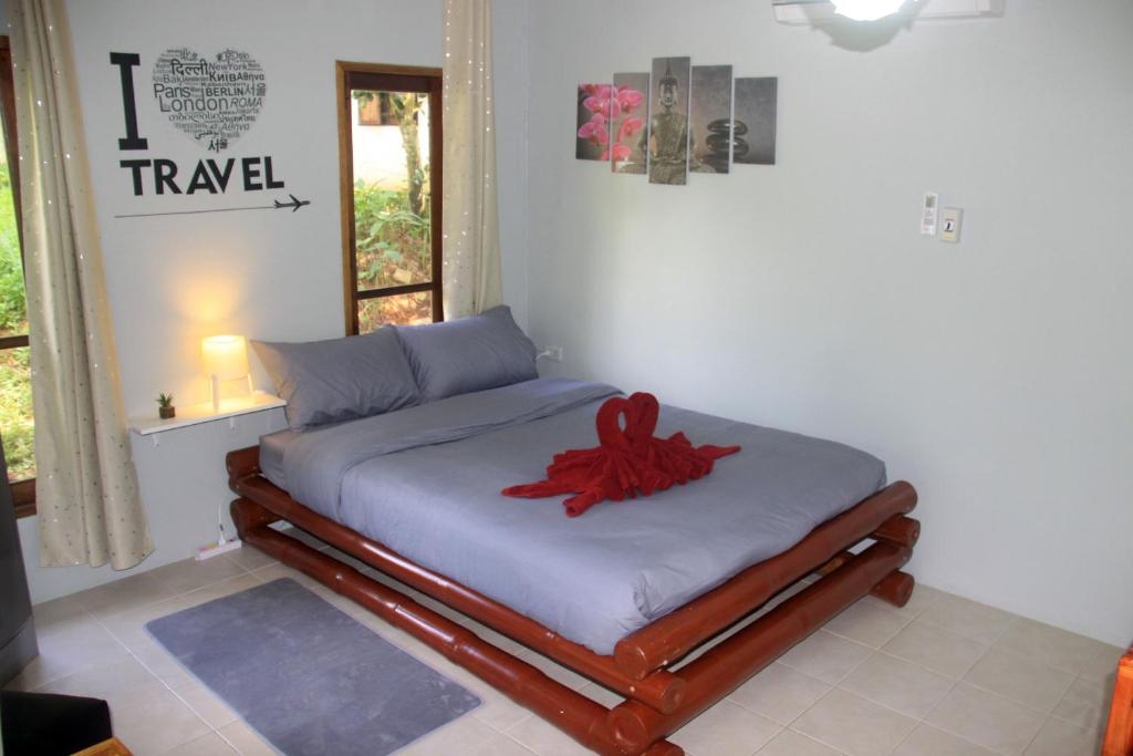 Postel nebo postele na pokoji v ubytování Tropical Paradise Leelawadee Resort