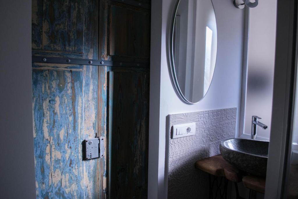 Een badkamer bij S'accabbadora Guest House