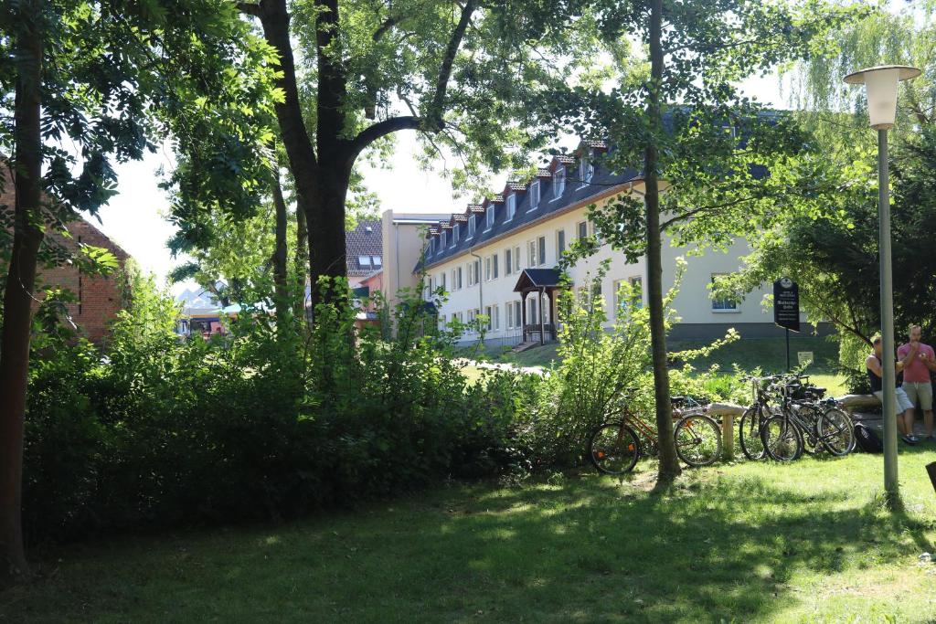 a group of bikes parked in front of a building at Radduscher Hafen in Vetschau