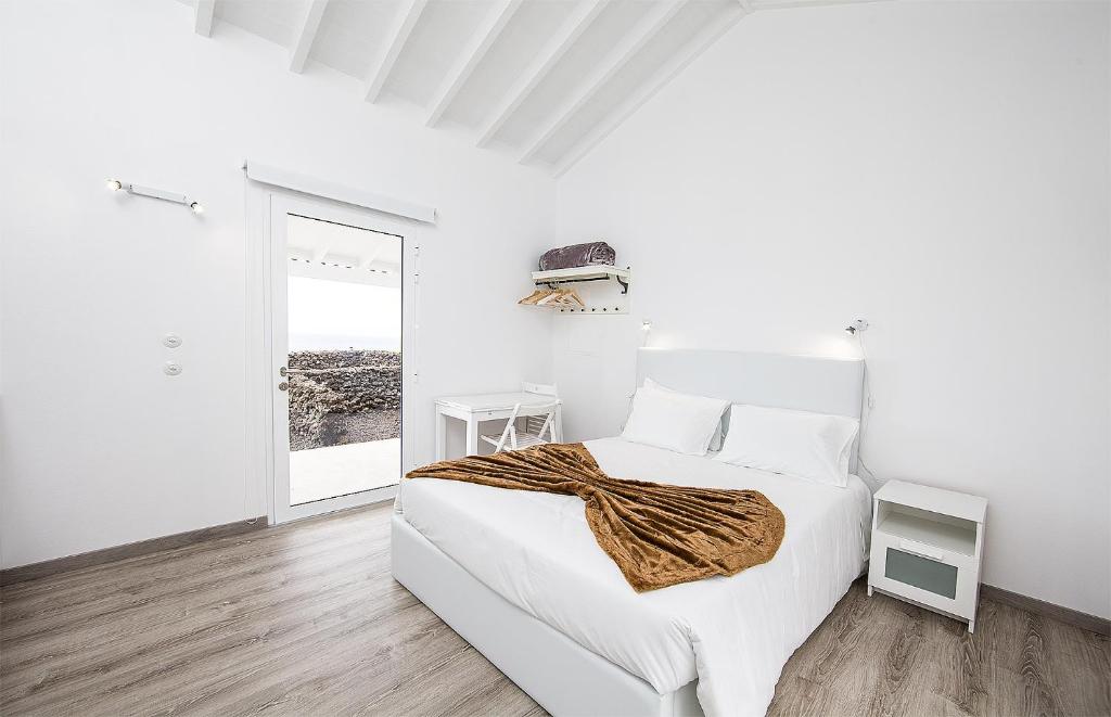 Postel nebo postele na pokoji v ubytování Insula Vinus Apartments