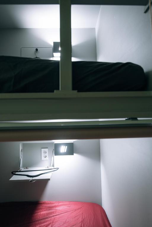 Postel nebo postele na pokoji v ubytování Daegu Midtown Hostel