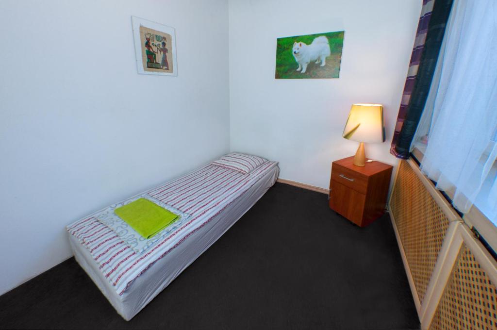 Posteľ alebo postele v izbe v ubytovaní Wilanowska Hostel