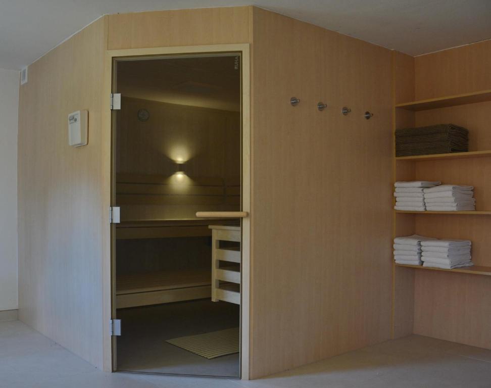 Postel nebo postele na pokoji v ubytování Moor-Rosl Apartmenthotel