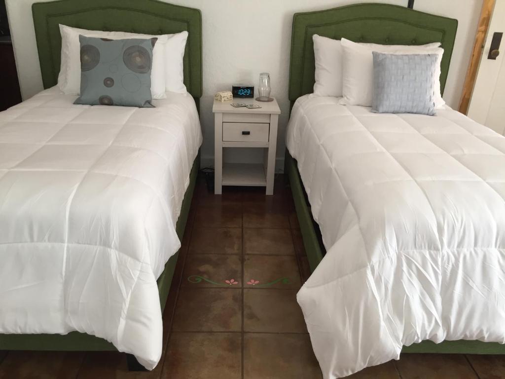 Postel nebo postele na pokoji v ubytování Casa Paloma B&B