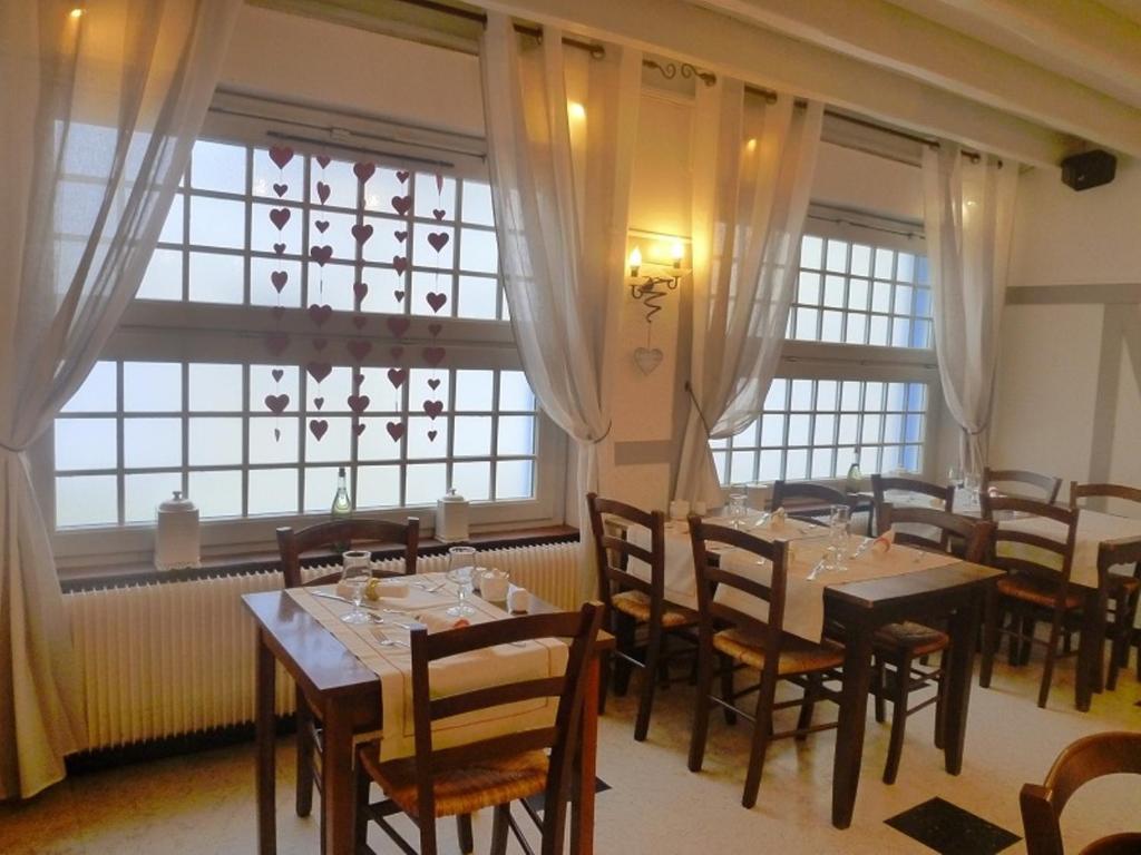 Posezení v ubytování Logis Hôtel & Restaurant "Au Gré du Vent"