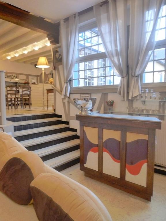 Posezení v ubytování Logis Hôtel & Restaurant "Au Gré du Vent"