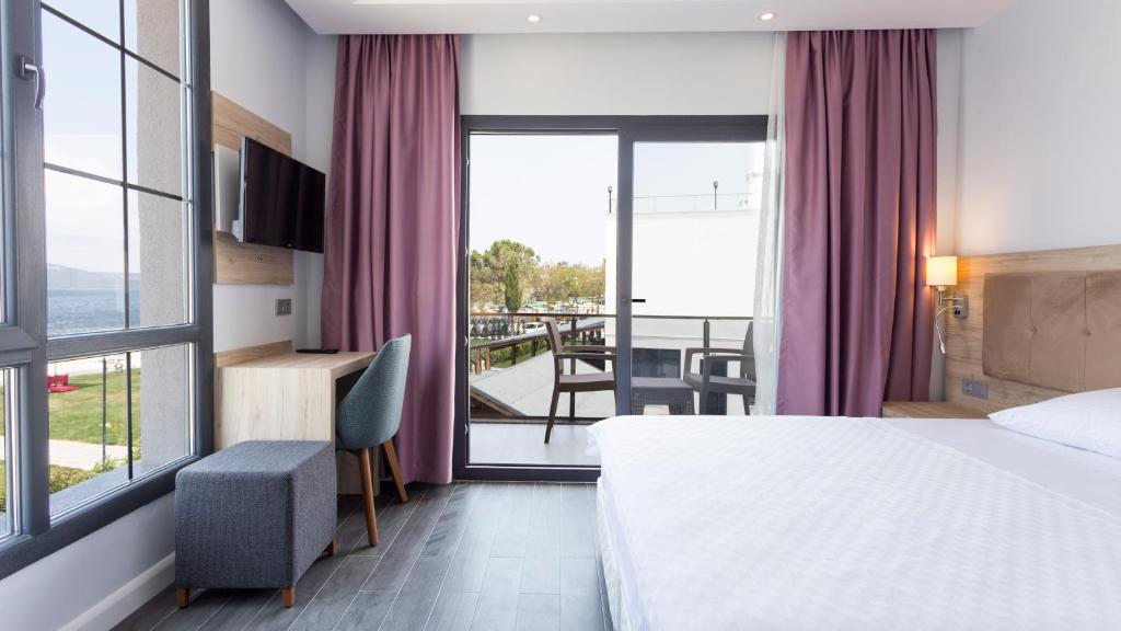Postel nebo postele na pokoji v ubytování Sunsan Hotel