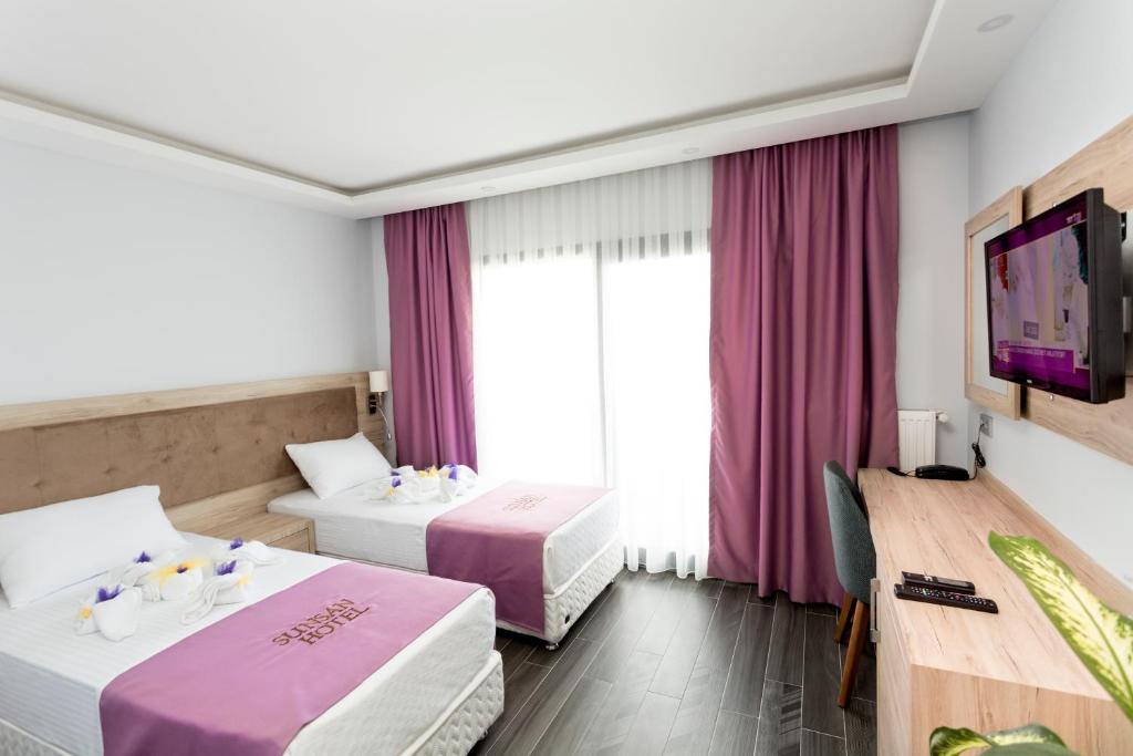 TV a/nebo společenská místnost v ubytování Sunsan Hotel