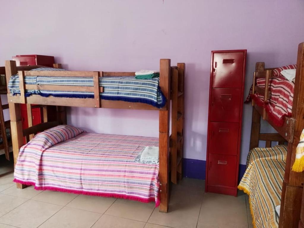 Postel nebo postele na pokoji v ubytování Olga Querida B&B Hostal