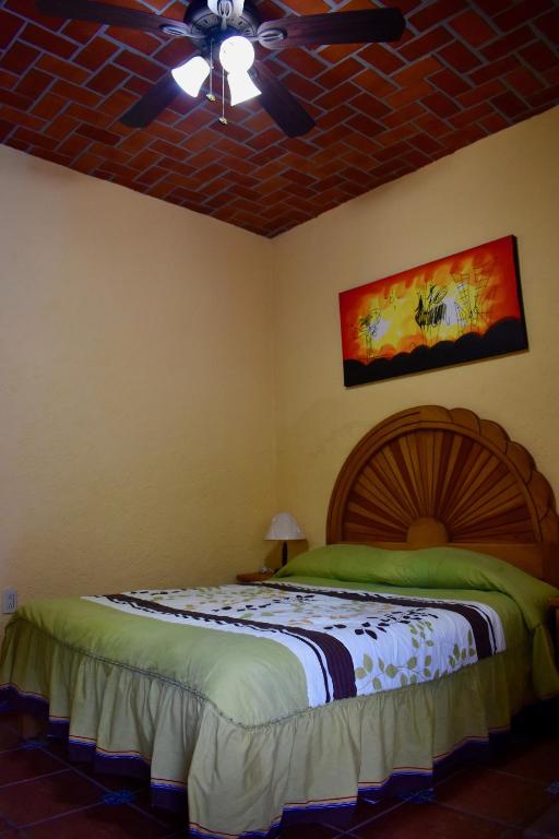 Postel nebo postele na pokoji v ubytování Posada Rincon Magico