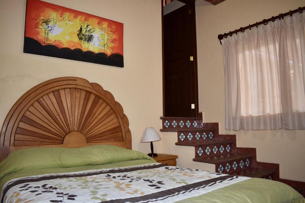 Postel nebo postele na pokoji v ubytování Posada Rincon Magico