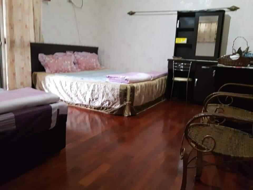 Postel nebo postele na pokoji v ubytování Dai Yi Shia B&B
