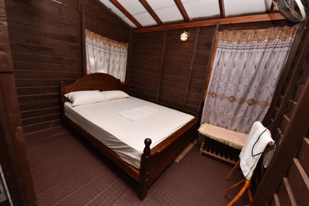 Postel nebo postele na pokoji v ubytování Pidurangala View Home Stay