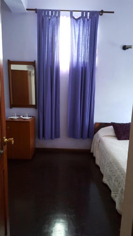 Postel nebo postele na pokoji v ubytování Chez Loutcha Residencial
