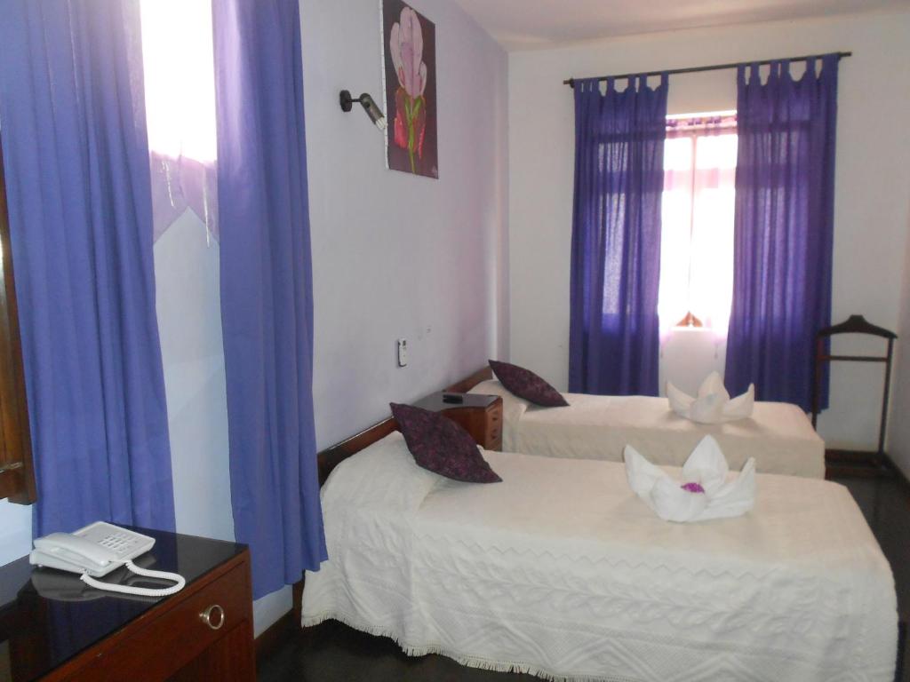 Postel nebo postele na pokoji v ubytování Chez Loutcha Residencial