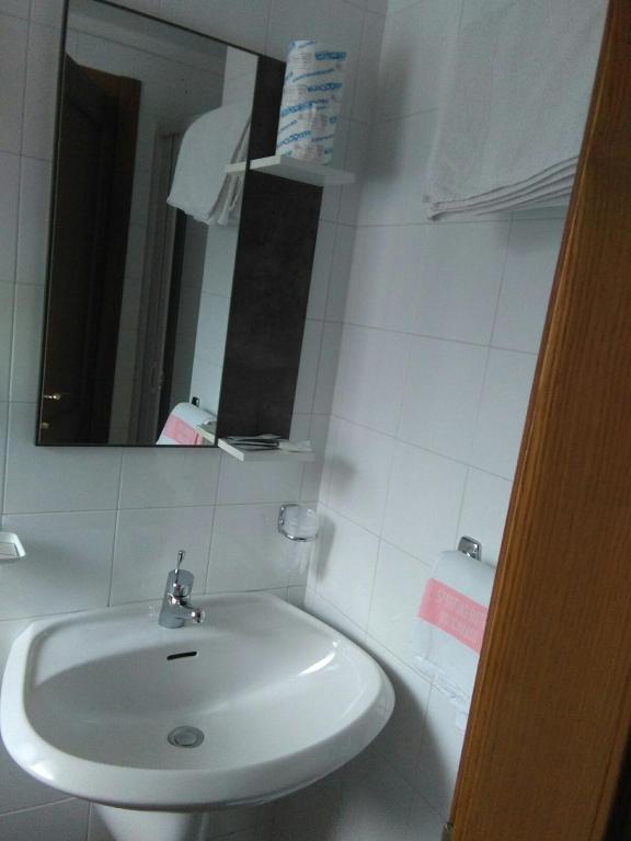 Koupelna v ubytování Hotel Sporting