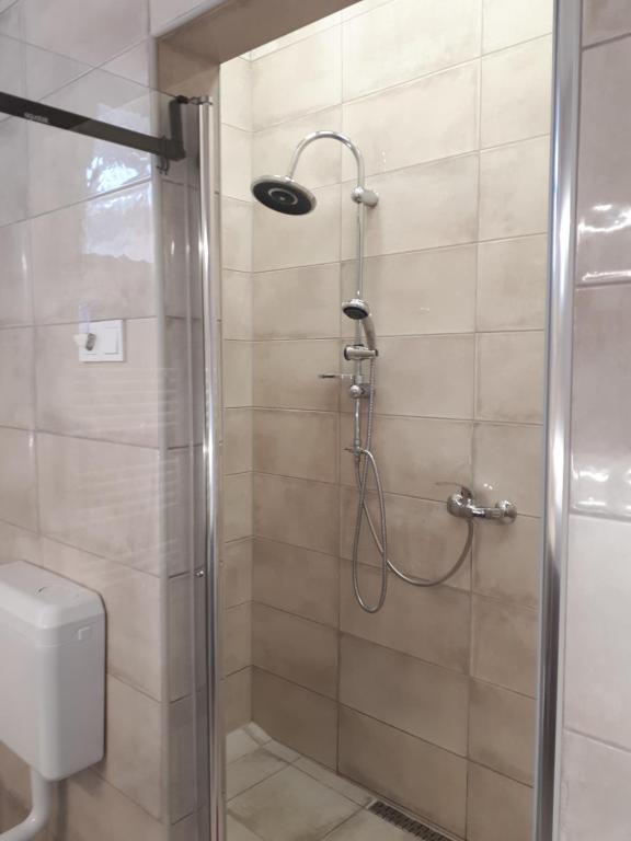 Łazienka w obiekcie Kertvárosi Apartman