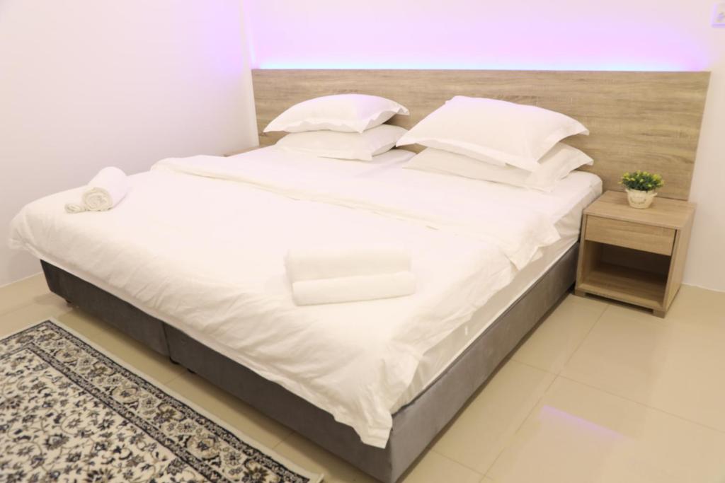 Postel nebo postele na pokoji v ubytování Moodhu Surf House