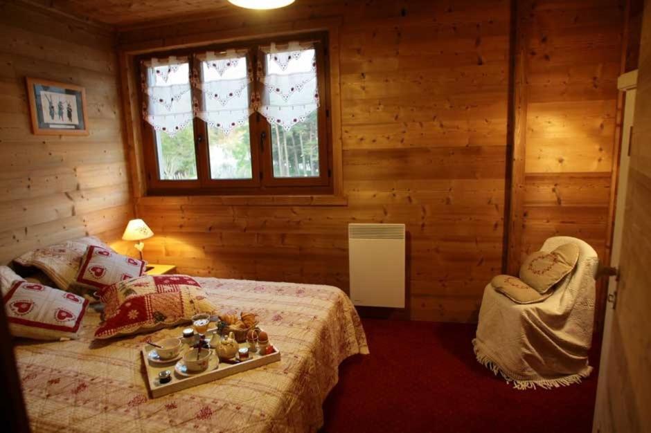 Postel nebo postele na pokoji v ubytování Chalet du champ Martel