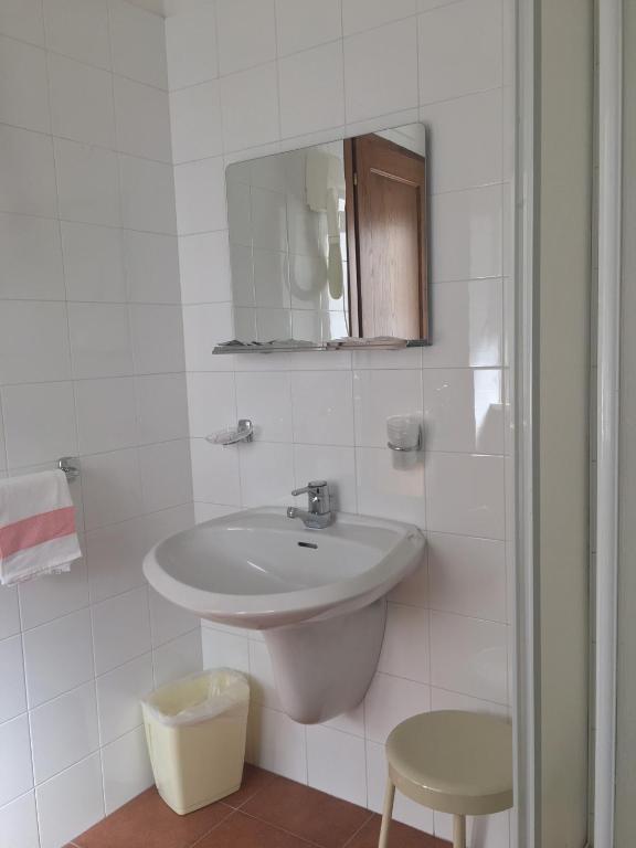 Koupelna v ubytování Hotel Sporting
