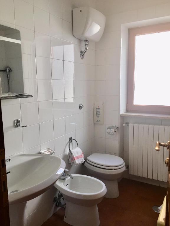 Koupelna v ubytování Hotel Sporting