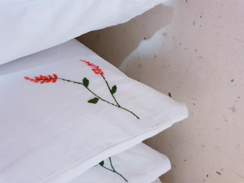 Ein Bett oder Betten in einem Zimmer der Unterkunft Hanok Raon