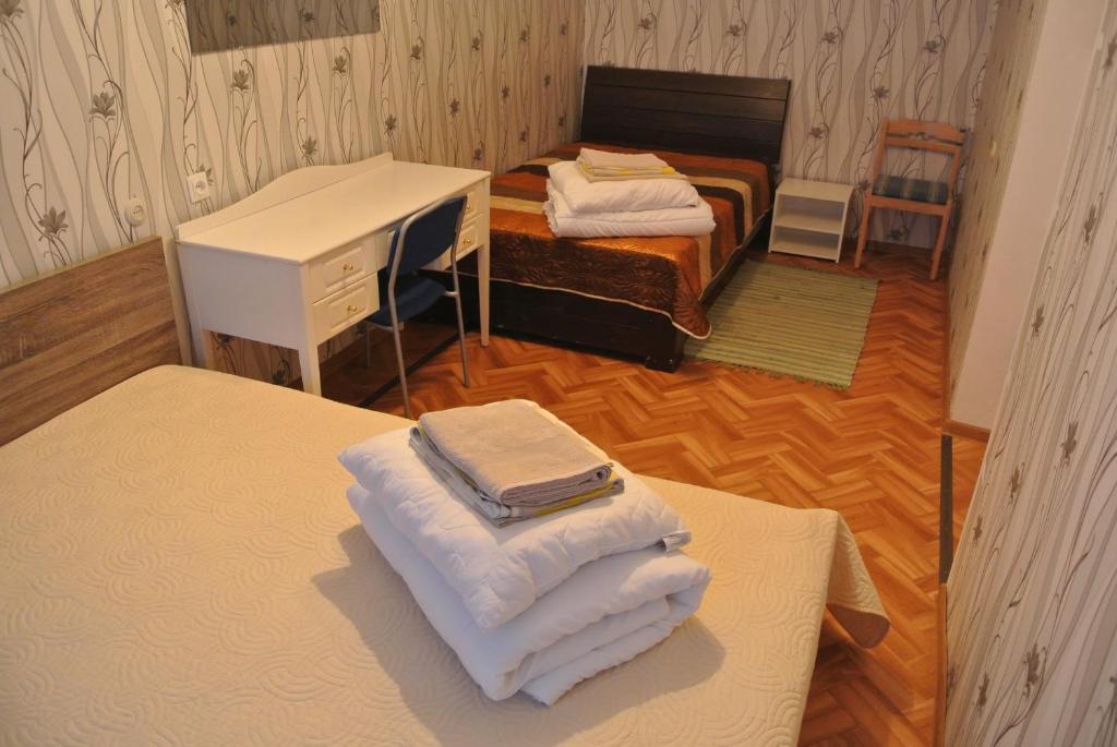 Postel nebo postele na pokoji v ubytování Narva Econom
