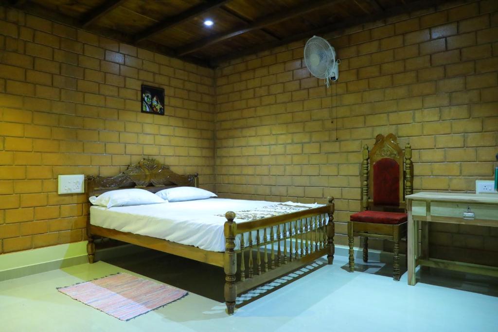 Postel nebo postele na pokoji v ubytování The Munroe Vibes Inn