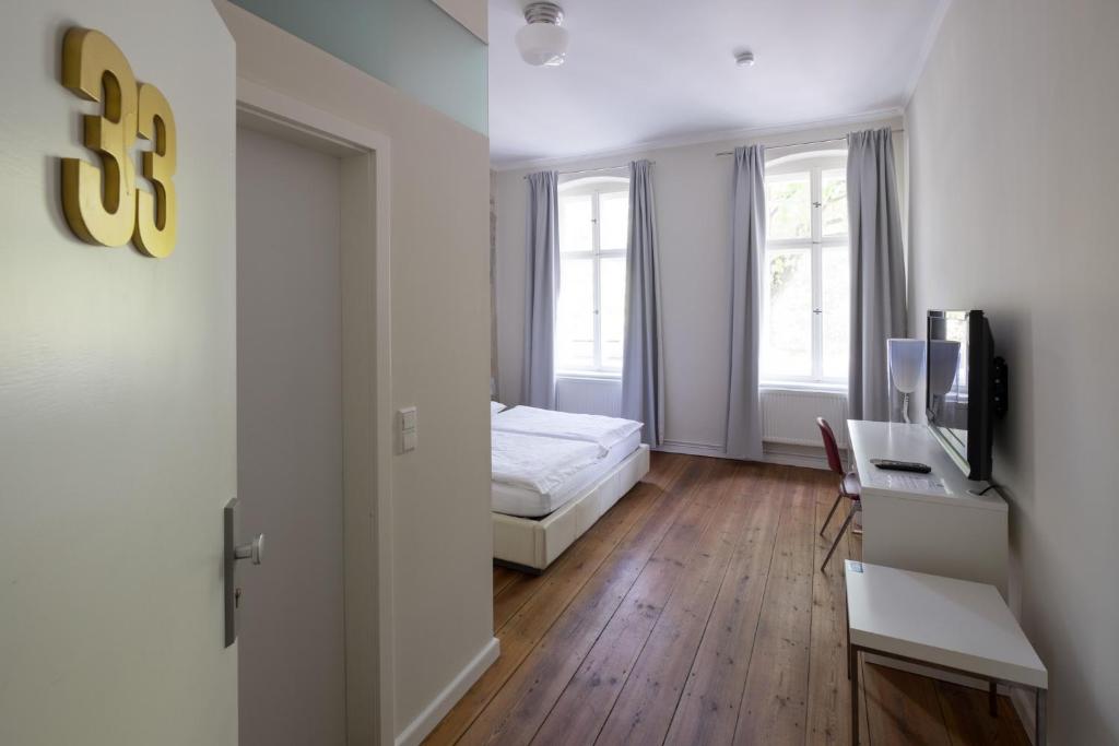 TV a/nebo společenská místnost v ubytování Jasper's Boutique Hotel