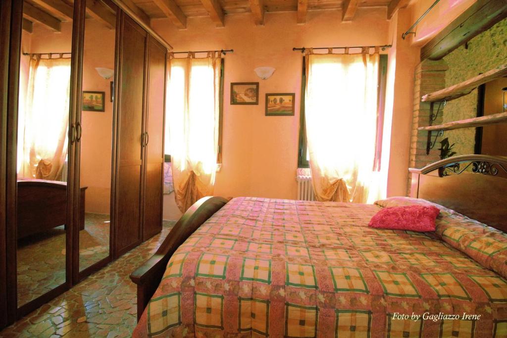 Postel nebo postele na pokoji v ubytování B&B Le Palme d'Oro