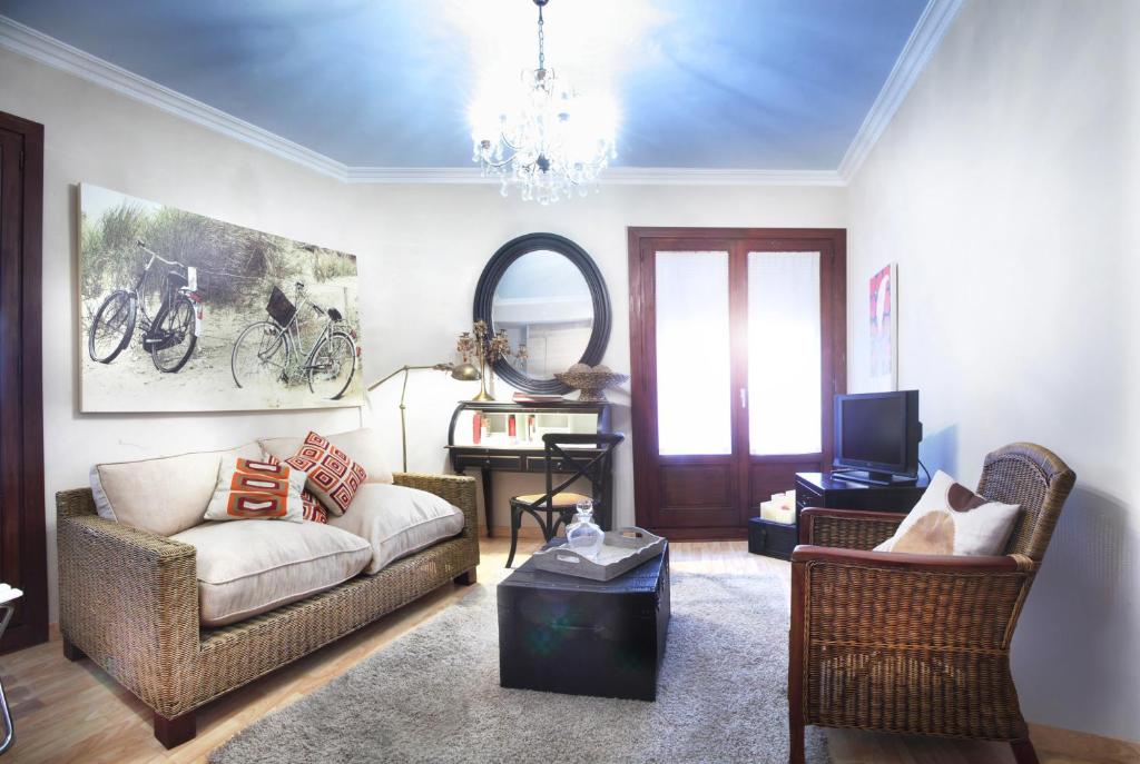 Posezení v ubytování Apartamentos Alcoba de Baco