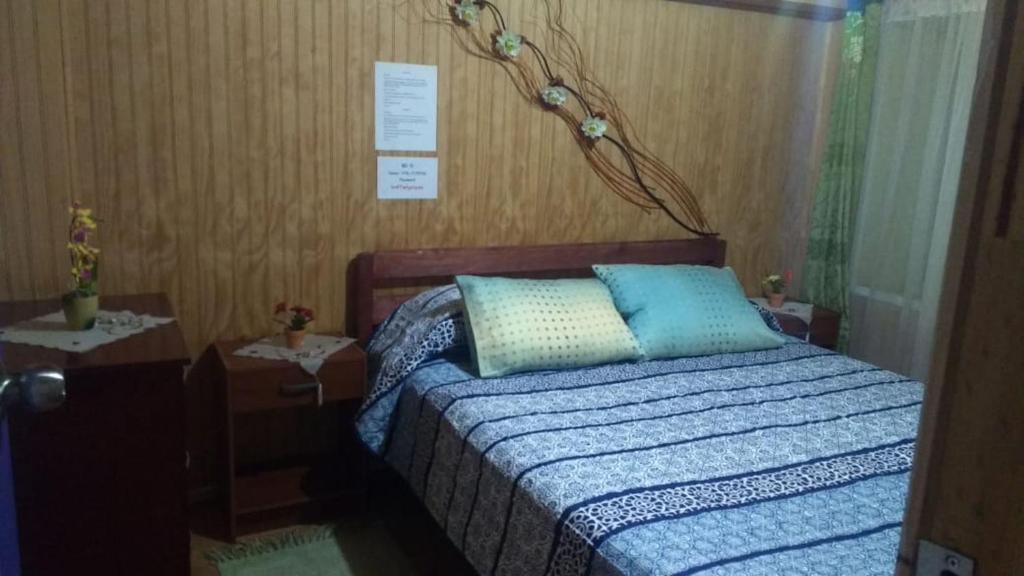 Postel nebo postele na pokoji v ubytování "Mi Hostal Tu Casa" Hostal Familiar SOLO EMPRESAS, TURISTAS y VIAJEROS Espacio para BICICLETAS y MOTOS