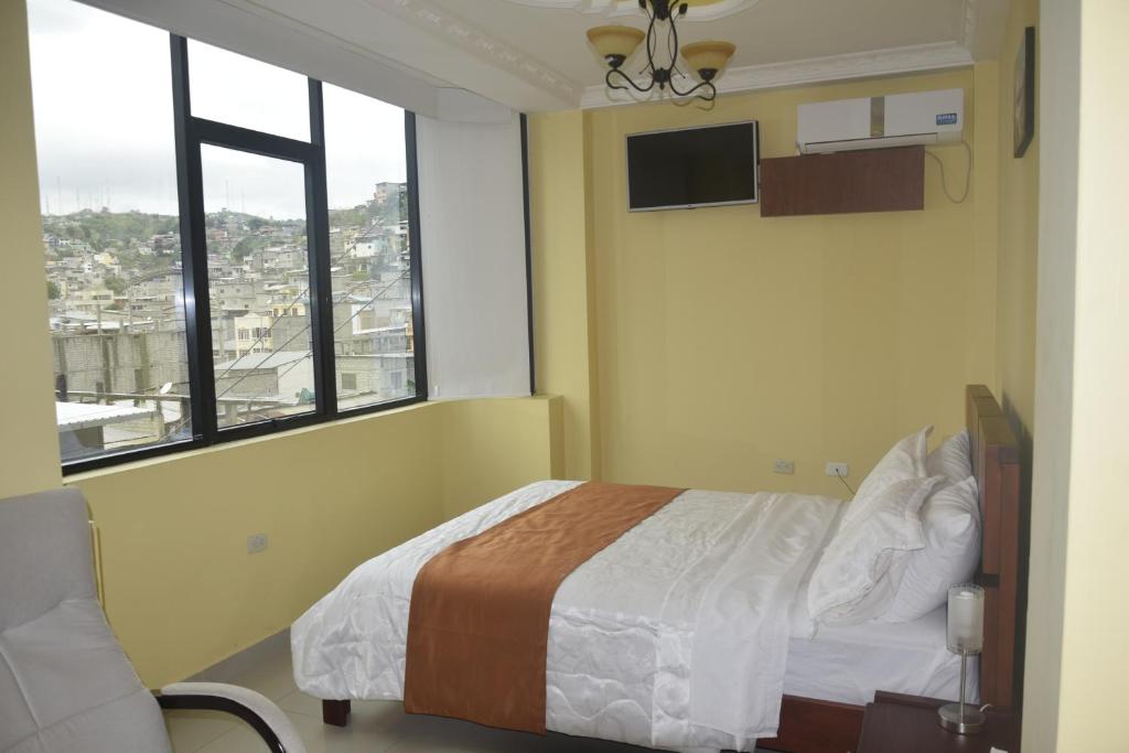 Postel nebo postele na pokoji v ubytování Olan´s Hotel Group