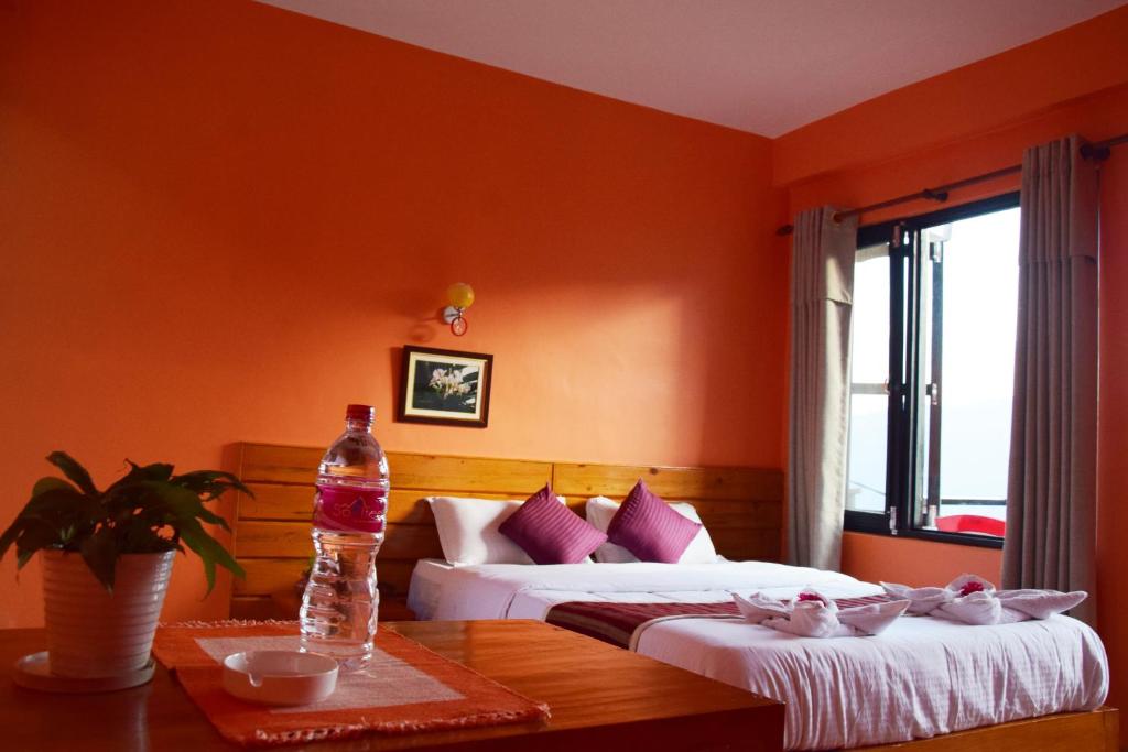 Letto o letti in una camera di Siddhartha Garden Ayurveda