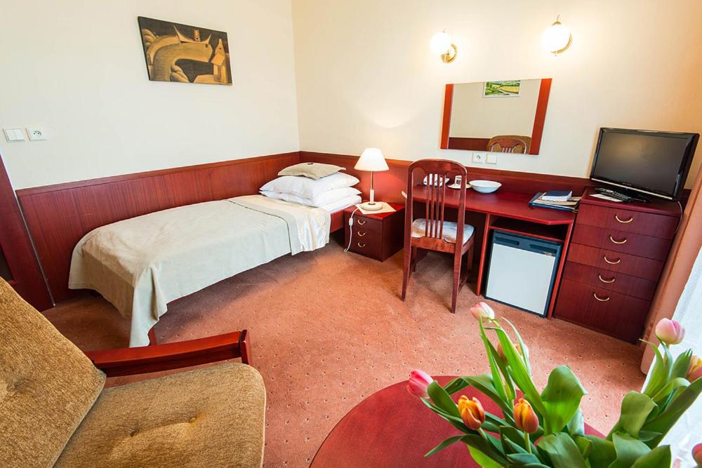 Postel nebo postele na pokoji v ubytování Monti Spa