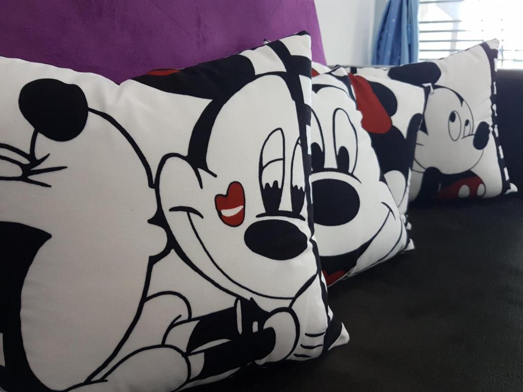 a group of pillows of mickey at Qstay Sitiawan Townhouse (Minnie Dreams) - 米妮梦 in Sitiawan