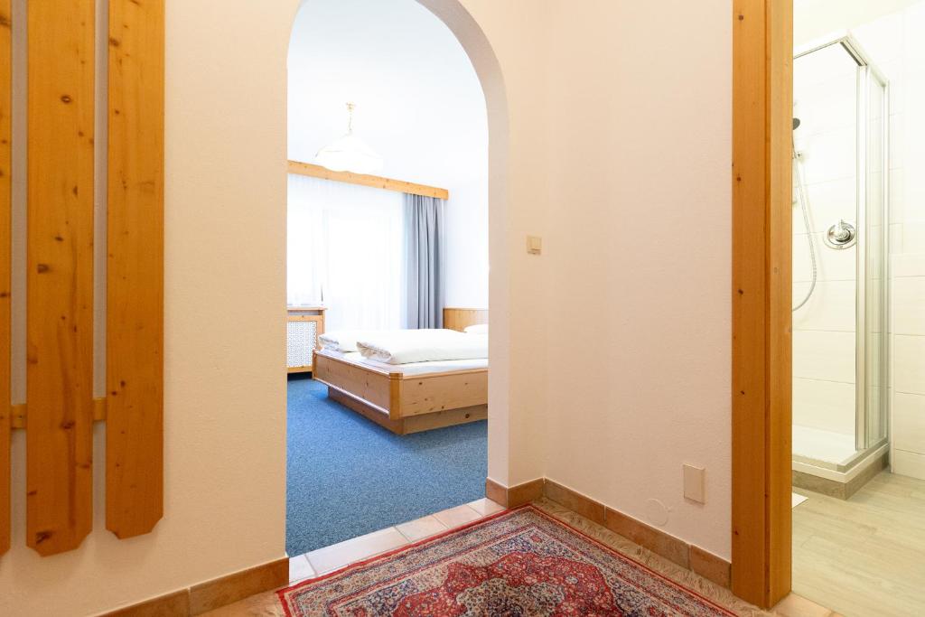 Postel nebo postele na pokoji v ubytování Pension Peter