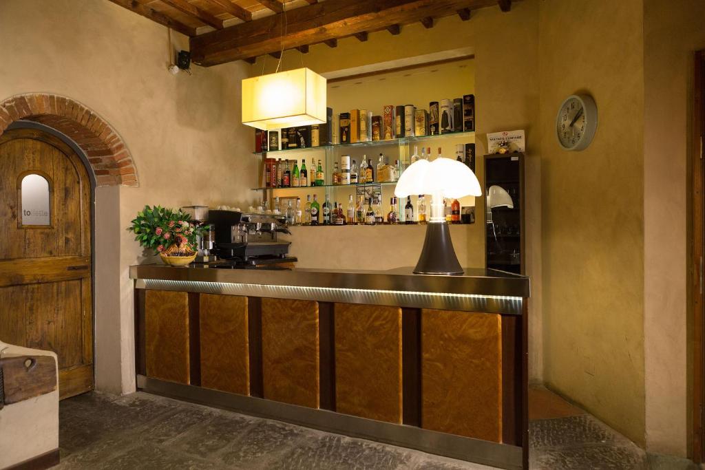 Lounge nebo bar v ubytování Hotel Le Capanne