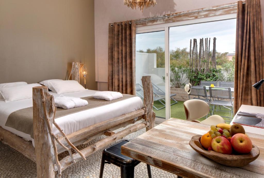 Postel nebo postele na pokoji v ubytování Vila De La Mar & Spa