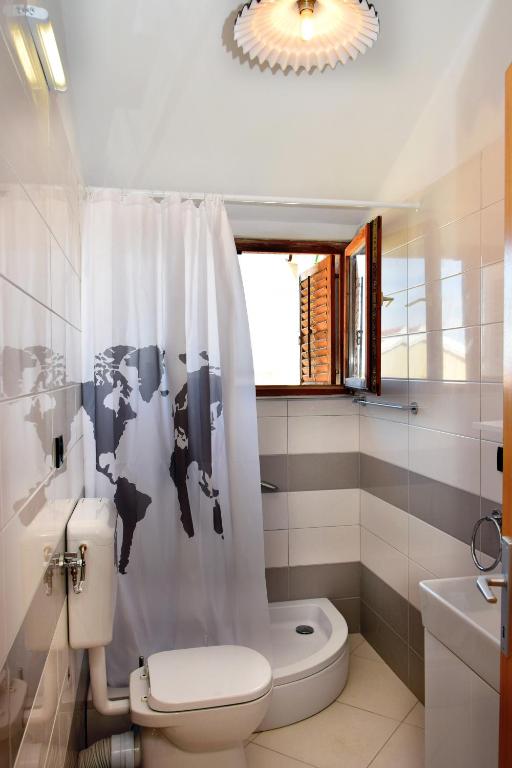 Kúpeľňa v ubytovaní Apartmani Gloria