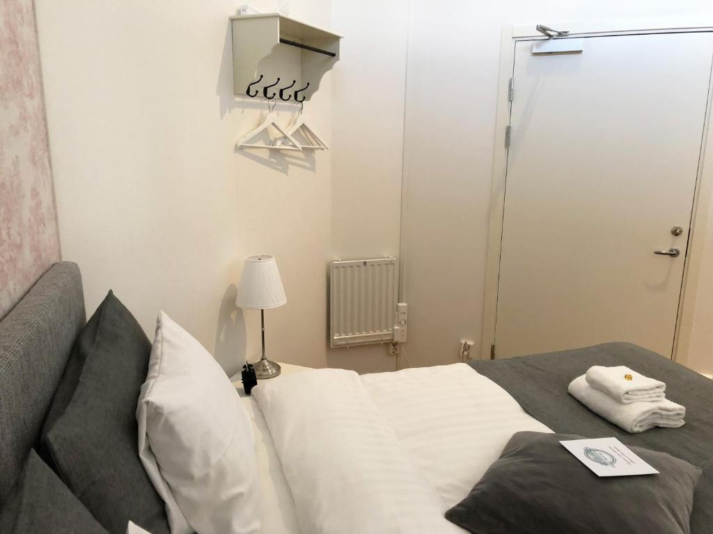Postel nebo postele na pokoji v ubytování Spirans Rum och Logi