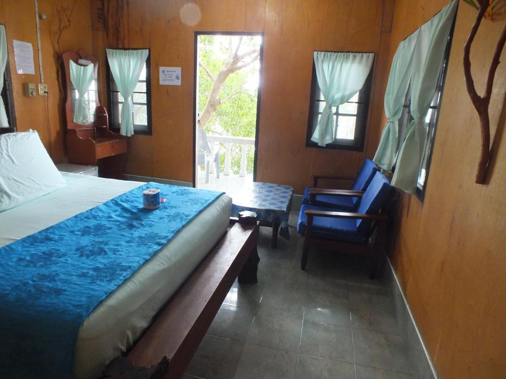 Postel nebo postele na pokoji v ubytování Queen Resort Koh Tao