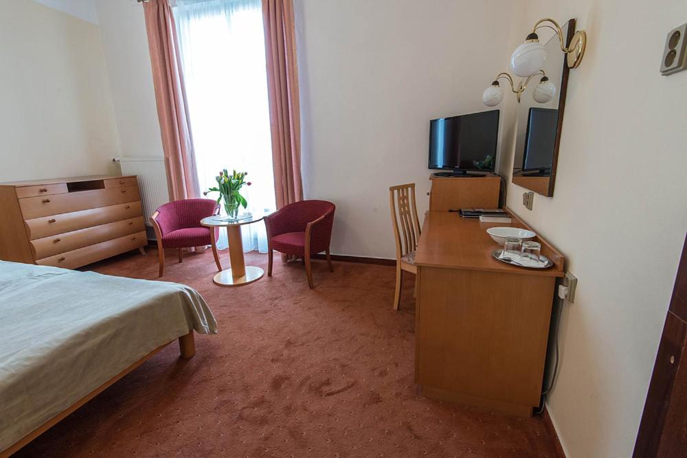 TV a/nebo společenská místnost v ubytování Monti Spa