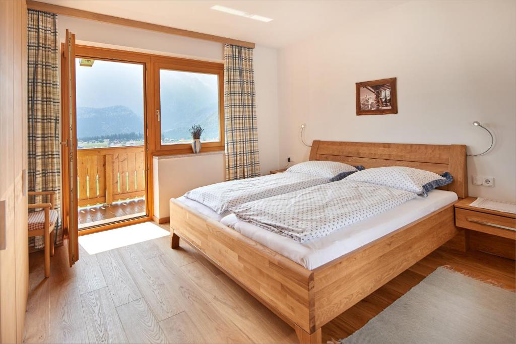 Postel nebo postele na pokoji v ubytování Haus Panoramablick