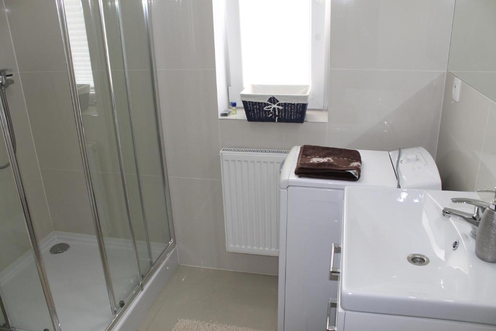 Kúpeľňa v ubytovaní Apartament Antoniukowska 60