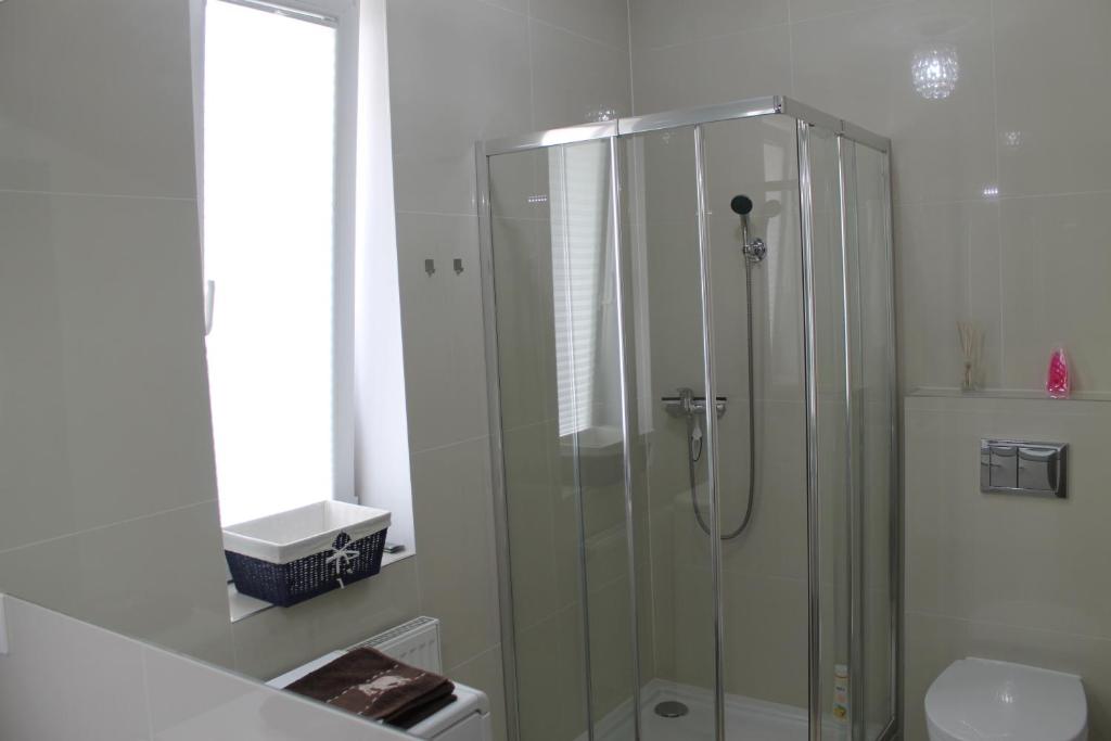 Kúpeľňa v ubytovaní Apartament Antoniukowska 60
